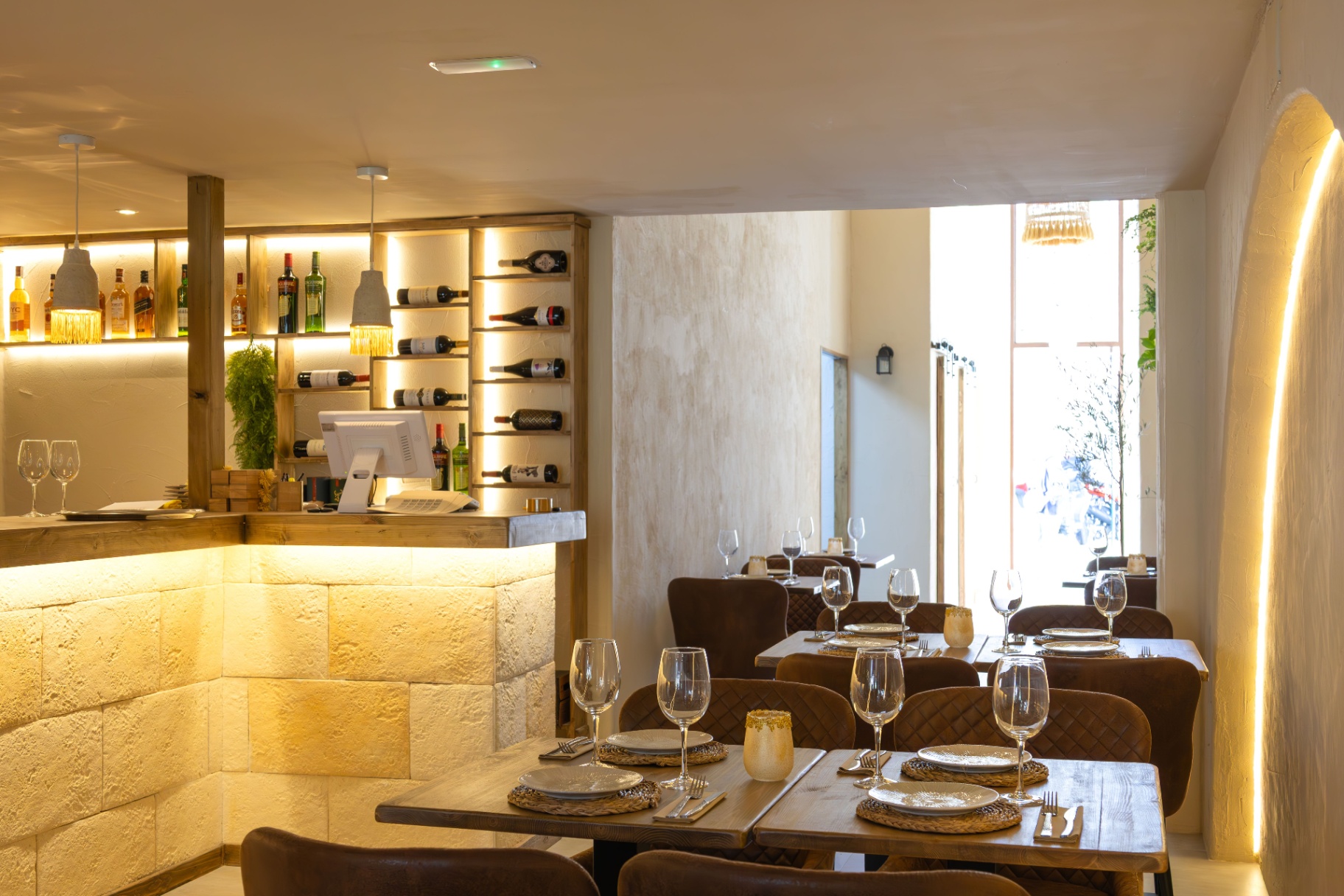 Interior bar and stone wall at Temblor Moraira
